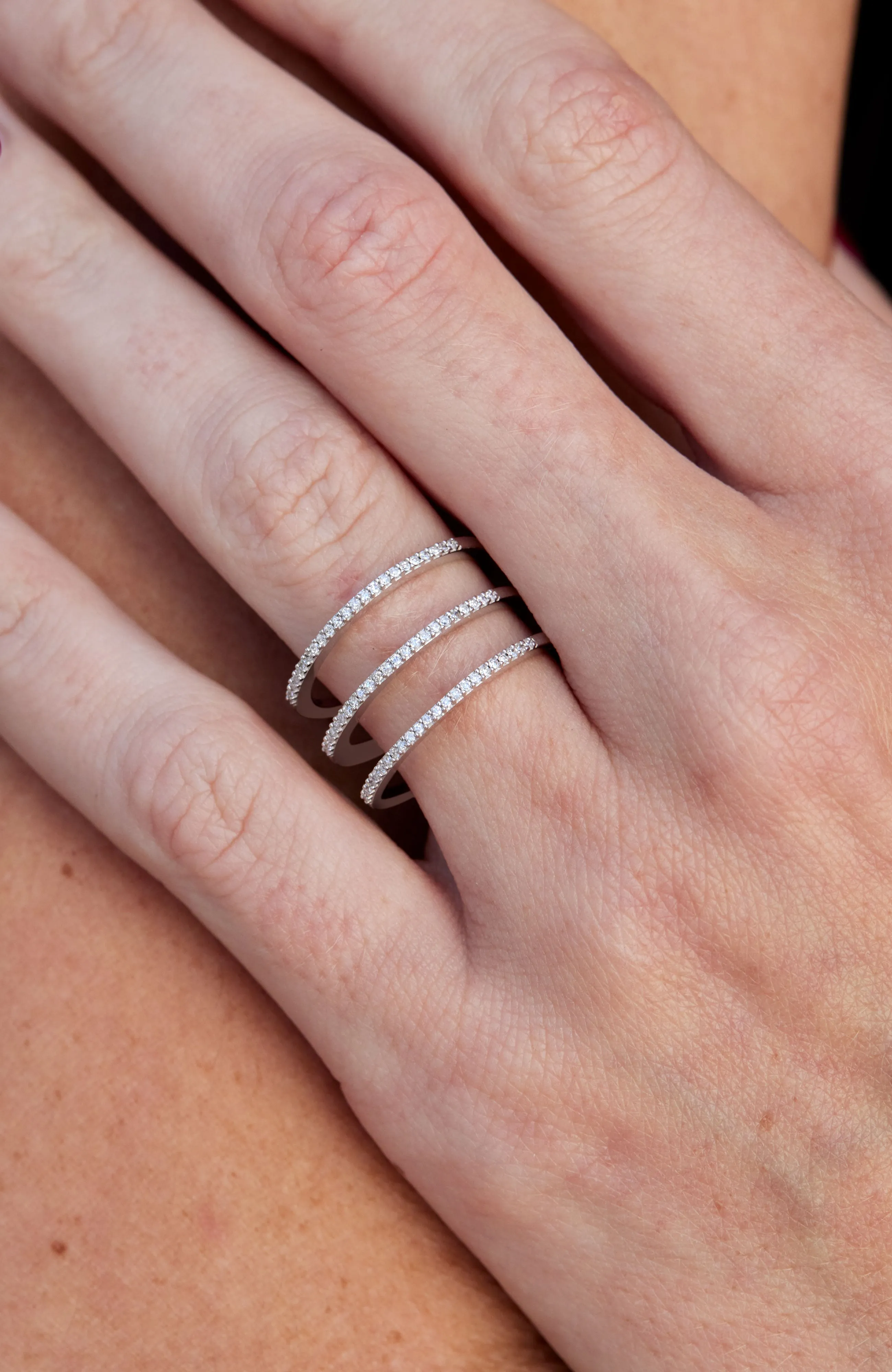 .925 STERLING SILVER RHODIUM PLATE TRIPLE ROW DIAMONDS RING