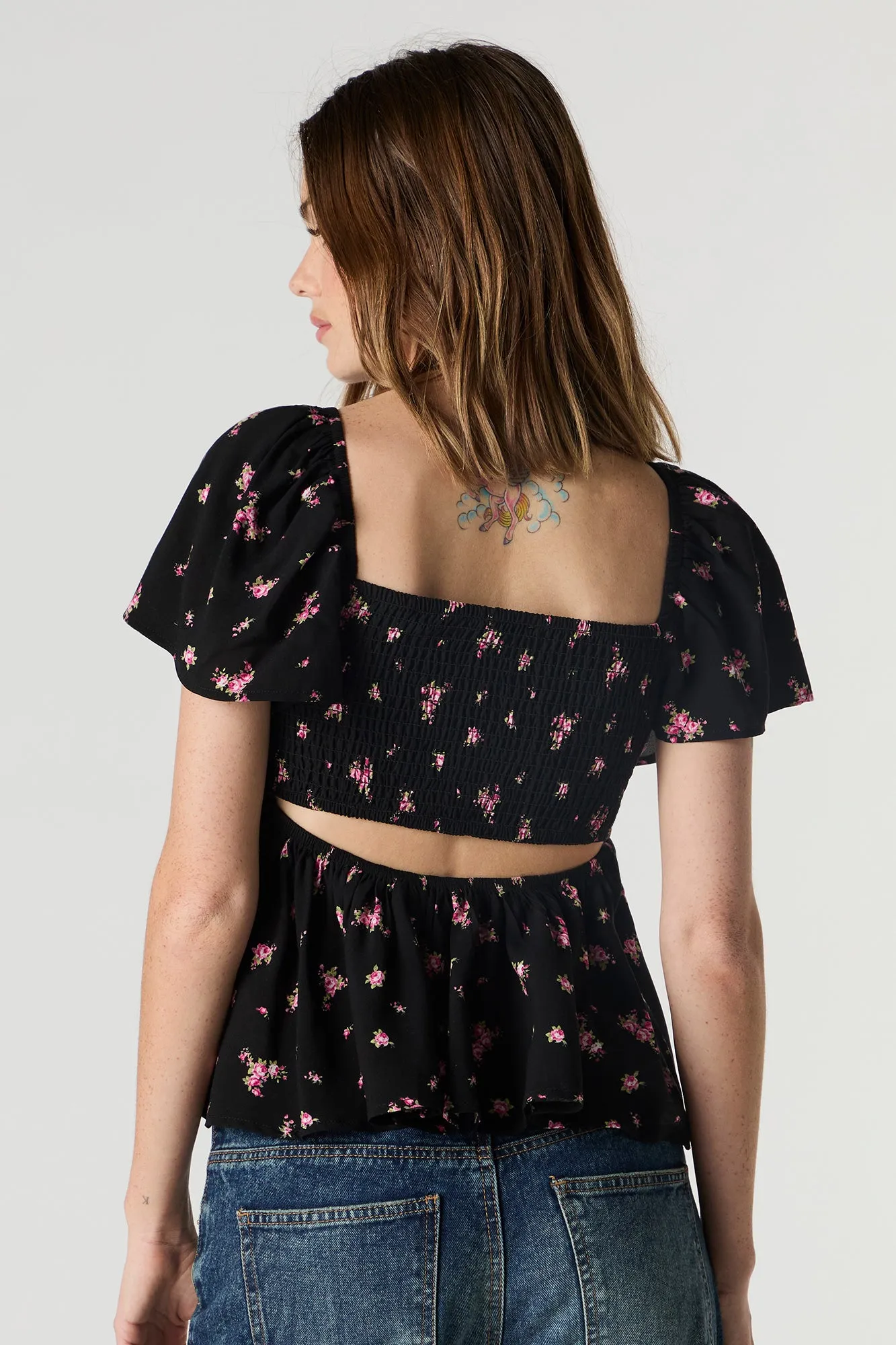 Haut de style laitière fleuri à manches courtes